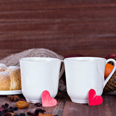 Two cups of tea in a romantic setting.