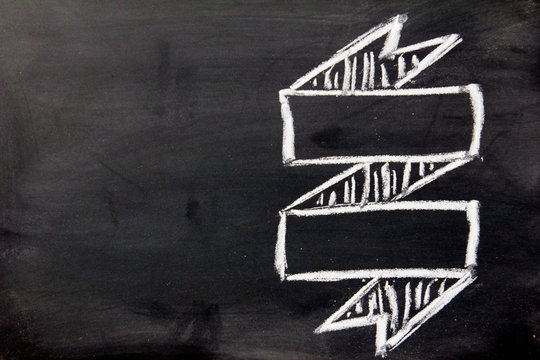 Blank ribbon draw by white chalk on black board background