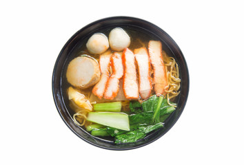 Egg noodle soup with red roast pork in bowl isolated on white background.
