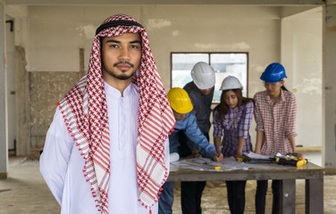 Happy smart business man arabic with team mates