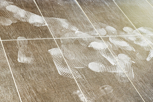 Foot Prints On The Tiled Floor, Construction Site