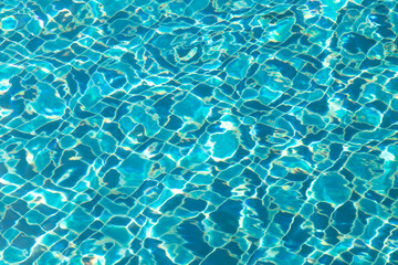 Blue ripped water in swimming pool.