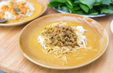 Thai rice vermicelli on wooden table.