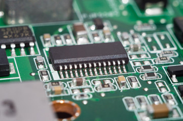 Electronic circuit board close up with chips processor