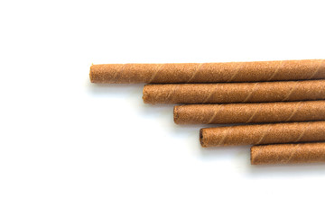 wafer rolls with chocolate isolated on white background.