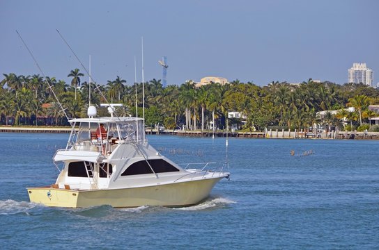 Sport fishing boat cruising on the florida intra-coastal waterway near Miami Beach.