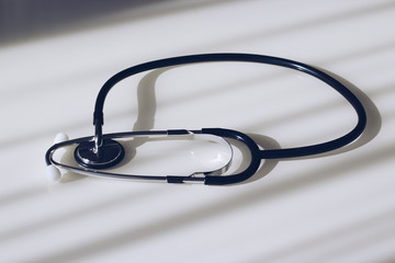 Stethoscope on the glass table