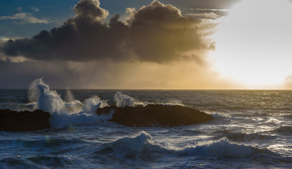 Strong waves at sunset - breathtaking Iceland in winter - amazing landscapes, storms and blizzards - photographers paradise