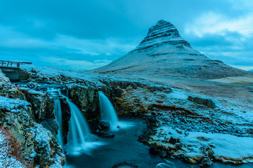 Kirkjufell on a cloudy and stormy day - breathtaking Iceland in winter - amazing landscapes, storms...