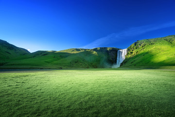 Skogarfoss waterfall and summer sunny day, Iceland