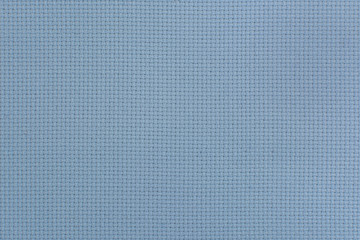 Close-up view of the blue linen fabric. Texture for the background