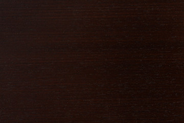 Wenge design texture of wood background closeup.