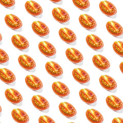 Pattern of fresh sliced tomato isolated on white background.