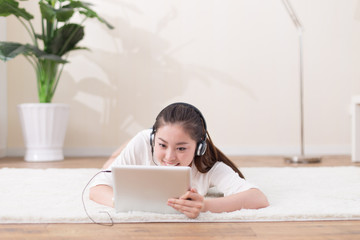 young pretty woman relaxes on blanket