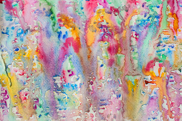 Abstract watercolor all colors of the rainbow background painting with spray, spots, splashes. Hand drawn on paper grain texture. For modern design.