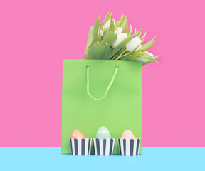 Shopping bag and easter egg with tulips