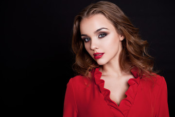 Young beautiful fashion model wearing red dress