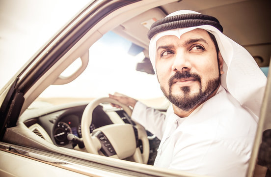 Arabic man in his luxury car