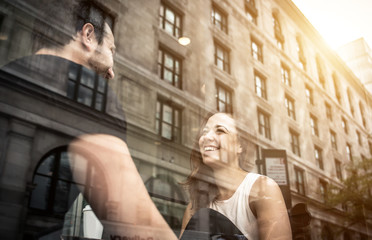 Fototapeta premium Couple sitting in a cafe drinking coffee
