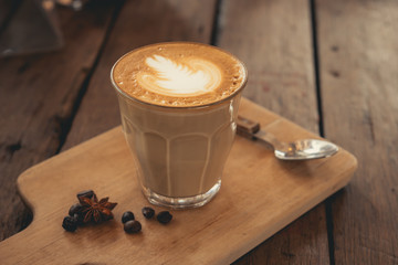 vintage hot latte on wood table
