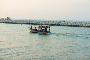 Fishing boat out to the sea