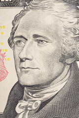 Vertical portrait of Alexander Hamilton's face on the US 10 dollar bill. Macro shot