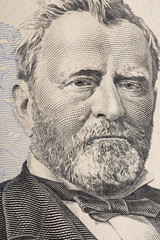 Vertical portrait of Ulysses Grant's face on the US 50 dollar bill. Macro shot