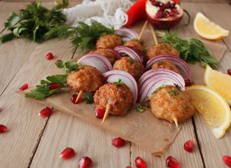 Kofta skewers, meatballs and red onion delicious oriental cuisine, top view
