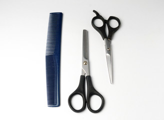 scissors and comb hair
