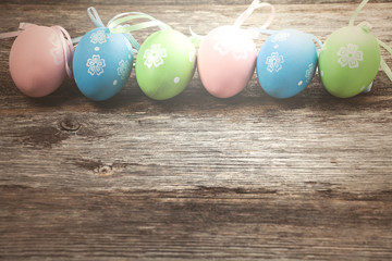 Easter eggs on wooden background