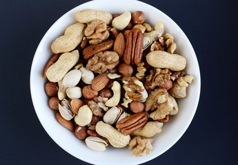 Assorted mixed nuts, peanuts, almonds, walnuts, pistachios, pecan, cashew, hazelnuts
