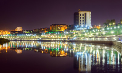 Fototapeta na wymiar Night view on river Tura, and Embankment in Tyumen