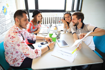 group of young business people , Startup entrepreneurs working on their venture in coworking space.