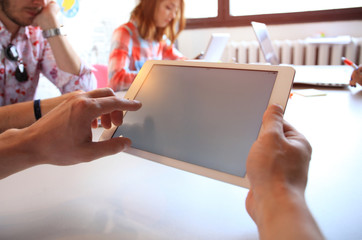 Business adviser analyzing financial figures denoting the progress in the work of the company.