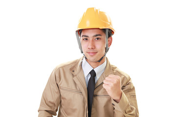 ガッツポーズの作業員
