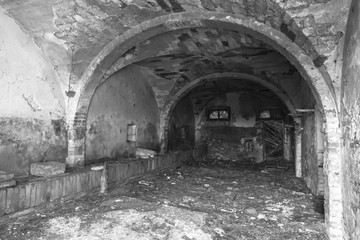 black and white interior view of an abandoned house
