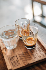 Vintage style closeup latte large cup with bokeh in cafe shop focus one point shallow with depth of field
