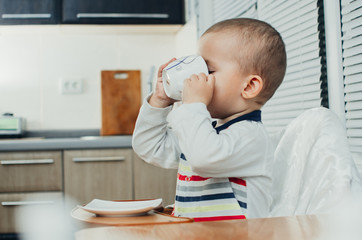 child drinking tea