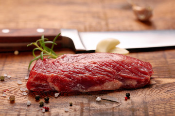 Raw beef steak on the table