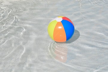 Naklejka premium Floating swimming pool ball in children's pool