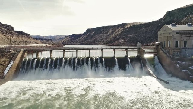 water from the Boise River filters through diversion dam