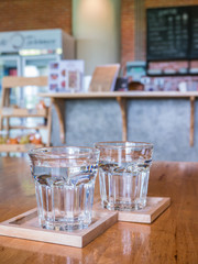 Glasses of water on a table in a coffee shop. Drinking water in a glass.