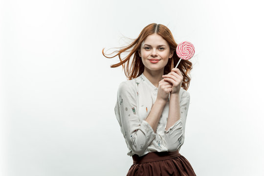 happy woman with lollipop