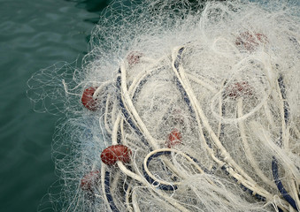 Fishing nets on the quay of the port. 