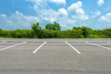 Empty parking lot on blue sky background