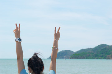 Woman travel hands two fingers Natural background