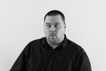 Obraz premium Nice Image of Cross Eyed Middle Aged Man in Black and White.