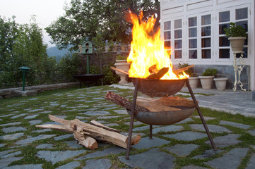 A Bonfire at Dusk in a Courtyard in the Himalayas, India