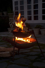 A Bonfire at Dusk in a Courtyard in the Himalayas, India