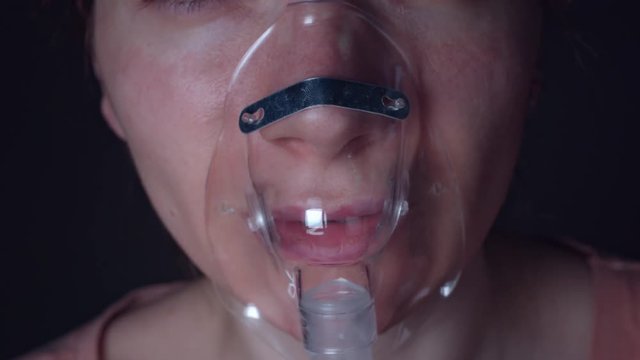 4K Close-Up Patient Putting on Breathing Oxy Mask